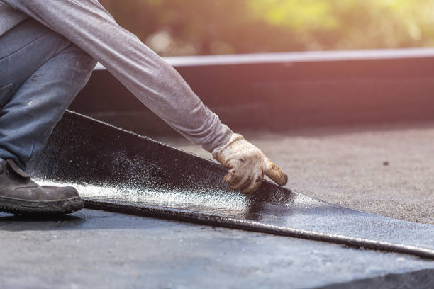 Professional Waterproofing technician working in Hingham, WI